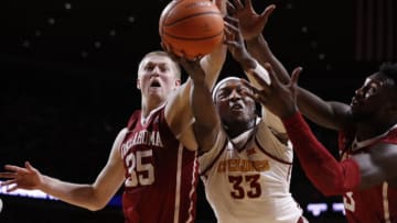 AMES, IA - FEBRUARY 10: Solomon Young #33 of the Iowa State Cyclones battles for a rebound with Brady Manek #35, and Khadeem Lattin #3 of the Oklahoma Sooners in the second half of play at Hilton Coliseum on February 10, 2018 in Ames, Iowa. The Iowa State Cyclones won 88-80 over the Oklahoma Sooners. (Photo by David Purdy/Getty Images)
