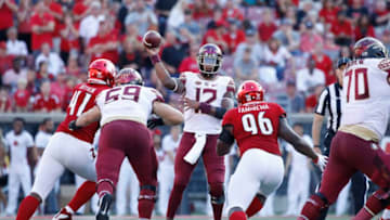 LOUISVILLE, KY - SEPTEMBER 29: Deondre Francois #12 of the Florida State Seminoles throws a pass in the fourth quarter of the game against the Louisville Cardinals at Cardinal Stadium on September 29, 2018 in Louisville, Kentucky. Florida State came from behind to win 28-24. (Photo by Joe Robbins/Getty Images)
