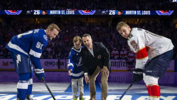 TAMPA, FL - NOVEMBER 21: Marty St. Louis is honored during a puck drop before the Tampa Bay Lightning skates against the Florida Panthers at Amalie Arena on November 21, 2018 in Tampa, Florida. (Photo by Scott Audette/NHLI via Getty Images)