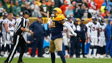 GREEN BAY, WISCONSIN - SEPTEMBER 22: Preston Smith #91 of the Green Bay Packers reacts after sacking Joe Flacco #5 of the Denver Broncos during the fourth quarter at Lambeau Field on September 22, 2019 in Green Bay, Wisconsin. (Photo by Nuccio DiNuzzo/Getty Images)