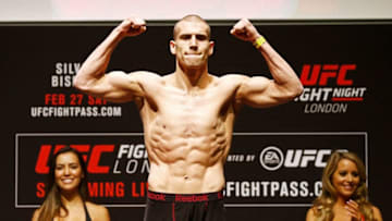 LONDON, ENGLAND - FEBRUARY 26: Tom Breese of England stands on the scales on stage during the UFC Fight Night Weigh-in held at at Indigo at The O2 Arena on February 26, 2016 in London, England. Tom Breese of England and Keita 'K-Taro' Keita of Japan will fight tomorrow night in the O2 Arena. (Photo by Dean Mouhtaropoulos/Zuffa LLC/Zuffa LLC via Getty Images)
