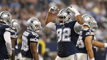 Nov 27, 2014; Arlington, TX, USA; Dallas Cowboys defensive end Jeremy Mincey (92) motions to get the crowd loader against the Philadelphia Eagles at AT&T Stadium. Mandatory Credit: Matthew Emmons-USA TODAY Sports