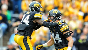 Oct 1, 2016; Iowa City, IA, USA; Iowa Hawkeyes defensive back Desmond King (14) and linebacker Ben Niemann (44) celebrate against the Northwestern Wildcats during the second quarter at Kinnick Stadium. Mandatory Credit: Jeffrey Becker-USA TODAY Sports
