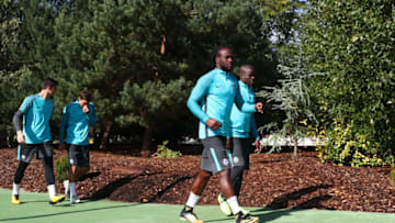 COBHAM, ENGLAND - SEPTEMBER 11: Victor Moses and N'Golo Kante of Chelsea walk out for a training session ahead of the UEFA Champions League Group C match against FK Qarabag at Chelsea Training Ground on September 11, 2017 in Cobham, England. (Photo by Dan Istitene/Getty Images)