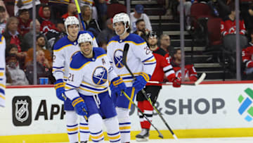 Apr 21, 2022; Newark, New Jersey, USA; Buffalo Sabres right wing Kyle Okposo (21) celebrates his goal against the New Jersey Devils during the second period at Prudential Center. Mandatory Credit: Ed Mulholland-USA TODAY Sports