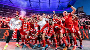 The Union Berlin players celebrate their win over Hertha Berlin. (Photo by Boris Streubel/Getty Images)