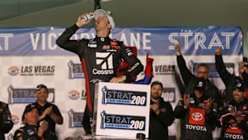LAS VEGAS, NEVADA - FEBRUARY 21: Kyle Busch, driver of the #51 Cessna Toyota, celebrates in Victory Lane after winning the the NASCAR Gander RV & Outdoors Truck Series Strat 200 at Las Vegas Motor Speedway on February 21, 2020 in Las Vegas, Nevada. (Photo by Matt Sullivan/Getty Images)