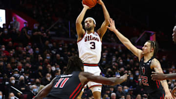 PISCATAWAY, NJ - FEBRUARY 16: Jacob Grandison #3 of the Illinois Fighting Illini in action against Clifford Omoruyi #11 and Caleb McConnell #22 of the Rutgers Scarlet Knights during a game at Jersey Mike's Arena on February 16, 2022 in Piscataway, New Jersey. Rutgers defeated Illinois 70-59. (Photo by Rich Schultz/Getty Images)
