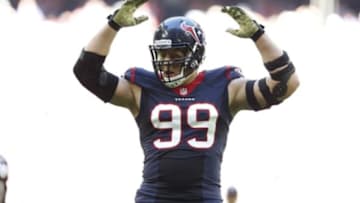Nov 23, 2014; Houston, TX, USA; Houston Texans defensive end J.J. Watt (99) motions to get the crown louder against the Cincinnati Bengals at NRG Stadium. Mandatory Credit: Matthew Emmons-USA TODAY Sports