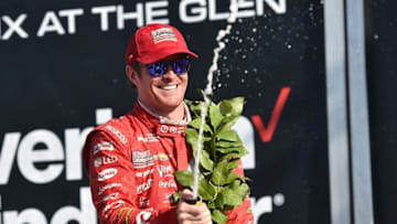 Scott Dixon sprays the champagne after winning the 2016 Grand Prix at the Glen. Photo Credit: Chris Owens/Courtesy of IndyCar