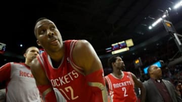 May 2, 2014; Portland, OR, USA; iHouston Rockets center Dwight Howard (12) reacts after Portland Trail Blazers guard Damian Lillard (0) last second shot in the second half in game six of the first round of the 2014 NBA Playoffs at the Moda Center.Mandatory Credit: Jaime Valdez-USA TODAY Sports
