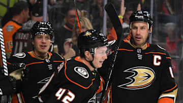 Rickard Rakell #67, Josh Manson #42 and Ryan Getzlaf #15 of the Anaheim Ducks (Photo by Ethan Miller/Getty Images)