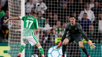 SEVILLA, SPAIN - MARCH 8: (L-R) Joaquin of Real Betis Sevilla, Courtois of Real Madrid during the La Liga Santander match between Real Betis Sevilla v Real Madrid at the Estadio Benito Villamarin on March 8, 2020 in Sevilla Spain (Photo by Eric Verhoeven/Soccrates/Getty Images)