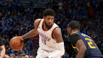 OKLAHOMA CITY, OK - APRIL 15: Paul George #13 of the Oklahoma City Thunder handles the ball against the Utah Jazz during Game One of Round One of the 2018 NBA Playoffs on April 15, 2018 at Chesapeake Energy Arena in Oklahoma City, Oklahoma. Copyright 2018 NBAE (Photo by Layne Murdoch/NBAE via Getty Images)
