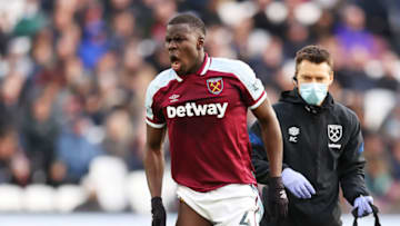LONDON, ENGLAND - DECEMBER 04: Kurt Zouma of West Ham United receives medical treatment during the Premier League match between West Ham United and Chelsea at London Stadium on December 04, 2021 in London, England. (Photo by Alex Pantling/Getty Images)