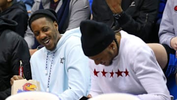 Jan 21, 2019; Lawrence, KS, USA; Former Kansas Jayhawks players Mario Chalmers and Brandon Rush during the second half against the Iowa State Cyclones at Allen Fieldhouse. Mandatory Credit: Jay Biggerstaff-USA TODAY Sports