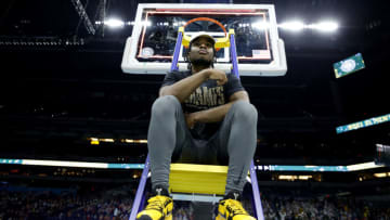 INDIANAPOLIS, INDIANA - APRIL 05: Davion Mitchell #45 of the Baylor Bears sits on a ladder with the trophy after defeating the Gonzaga Bulldogs in the National Championship game of the 2021 NCAA Men's Basketball Tournament at Lucas Oil Stadium on April 05, 2021 in Indianapolis, Indiana. The Baylor Bears defeated the Gonzaga Bulldogs 86-70. (Photo by Tim Nwachukwu/Getty Images)