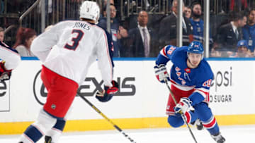 NEW YORK, NY - JANUARY 19: Chris Kreider #20 of the New York Rangers skates with the puck against Seth Jones #3 of the Columbus Blue Jackets at Madison Square Garden on January 19, 2020 in New York City. (Photo by Jared Silber/NHLI via Getty Images)