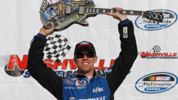 LEBANON, TN - APRIL 23: Carl Edwards, driver of the #60 Ford DriveOne Ford celebrates in victory lane after winning the NASCAR Nationwide Series Nashville 300 at Nashville Superspeedway on April 23, 2011 in Lebanon, Tennessee. (Photo by Jason Smith/Getty Images for NASCAR)