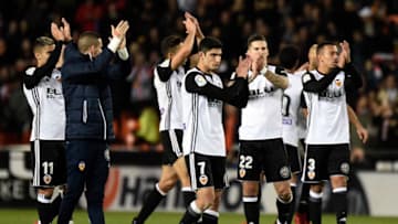 Valencia's players applaud at the end of the Spanish league football match Valencia CF and FC Barcelona at Mestalla stadium in Valencia on November 26, 2017. / AFP PHOTO / JOSE JORDAN (Photo credit should read JOSE JORDAN/AFP/Getty Images)