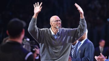 LOS ANGELES, CA - FEBRUARY 18: Kareem Abdul-Jabbar waves to the fans from center court during a commemoration ceremony at halftime of the NBA All-Star Game 2018 at Staples Center on February 18, 2018 in Los Angeles, California. (Photo by Kevork Djansezian/Getty Images)
