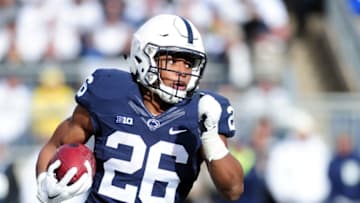 STATE COLLEGE, PA - NOVEMBER 21: Saquon Barkley #26 of the Penn State Nittany Lions runs with the ball in the second quarter against the Michigan Wolverines at Beaver Stadium on November 21, 2015 in State College, Pennsylvania. (Photo by Evan Habeeb/Getty Images)