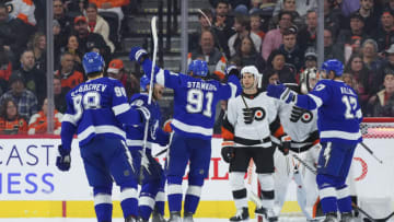 PHILADELPHIA, PA - DECEMBER 01: Steven Stamkos #91 of the Tampa Bay Lightning reacts after recording his 1000th career NHL point with an assist on a goal by Nicholas Paul #20 (not pictured) against the Philadelphia Flyers in the second period at the Wells Fargo Center on December 1, 2022 in Philadelphia, Pennsylvania. (Photo by Mitchell Leff/Getty Images)