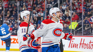 WINNIPEG, MB - DECEMBER 23: Tomas Tatar #90 of the Montreal Canadiens celebrates his first period goal against the Winnipeg Jets at the Bell MTS Place on December 23, 2019 in Winnipeg, Manitoba, Canada. (Photo by Jonathan Kozub/NHLI via Getty Images)