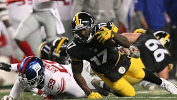 Dec 4, 2016; Pittsburgh, PA, USA; Pittsburgh Steelers wide receiver Eli Rogers (17) stretches for a first down against the New York Giants during the first half at Heinz Field. Mandatory Credit: Jason Bridge-USA TODAY Sports
