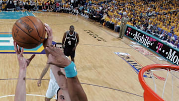 Bonzi Wells, New Orleans Hornets. Manu Ginobili, San Antonio Spurs. (Photo by Chris Graythen/Getty Images)
