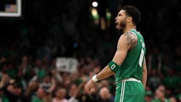 BOSTON, MASSACHUSETTS - MAY 14: Jayson Tatum #0 of the Boston Celtics celebrates a basket against the Philadelphia 76ers during the third quarter in game seven of the 2023 NBA Playoffs Eastern Conference Semifinals at TD Garden on May 14, 2023 in Boston, Massachusetts. NOTE TO USER: User expressly acknowledges and agrees that, by downloading and or using this photograph, User is consenting to the terms and conditions of the Getty Images License Agreement. (Photo by Adam Glanzman/Getty Images)