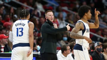 Jan 7, 2022; Houston, Texas, USA; Dallas Mavericks acting head coach Sean Sweeney reacts during the second quarter against the Houston Rockets at Toyota Center. Mandatory Credit: Troy Taormina-USA TODAY Sports