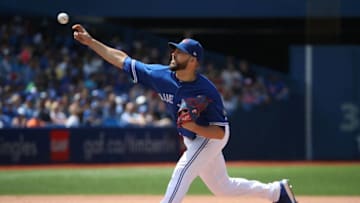 Ryan Tepera #52 of the Toronto Blue Jays delivers a pitch in the ninth inning during MLB game action. (Photo by Tom Szczerbowski/Getty Images)