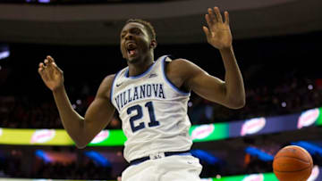 PHILADELPHIA, PA - JANUARY 27: Dhamir Cosby-Roundtree #21 of the Villanova Wildcats reacts after dunking the ball against the Seton Hall Pirates in the second half at the Wells Fargo Center on January 27, 2019 in Philadelphia, Pennsylvania. Villanova defeated Seton Hall 80-52. (Photo by Mitchell Leff/Getty Images)