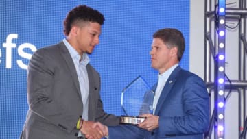Feb 4, 2017; Houston, TX, USA; Texas Tech quarterback Patrick Mahomes II presents the humanitarian award to Kansas City Chiefs owner Clark Hunt during the Leigh Steinberg party at Hughes Manor. Mandatory Credit: John David Mercer-USA TODAY Sports