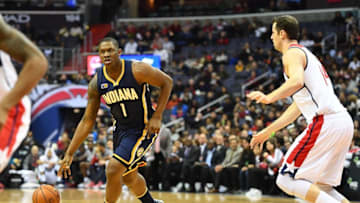 Dec 28, 2016; Washington, DC, USA; Indiana Pacers center Kevin Seraphin (1) dribbles as Washington Wizards forward Jason Smith (14) looks on during the first half at Verizon Center. Mandatory Credit: Brad Mills-USA TODAY Sports