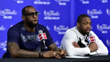 Jun 15, 2014; San Antonio, TX, USA; Miami Heat forward LeBron James (6) and guard Dwyane Wade (3) speak during a press conference after game five of the 2014 NBA Finals at AT&T Center. Mandatory Credit: Bob Donnan-USA TODAY Sports