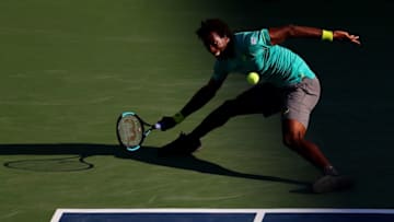 NEW YORK, NY - AUGUST 31: Gael Monfils of France returns a shot against Donald Young of the United States during their second round Men's Singles match on Day Four of the 2017 US Open at the USTA Billie Jean King National Tennis Center on August 31, 2017 in the Flushing neighborhood of the Queens borough of New York City. (Photo by Al Bello/Getty Images)