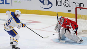 Jan 22, 2021; Washington, District of Columbia, USA; Washington Capitals goaltender Vitek Vanecek (41) makes a save in Buffalo Sabres center Jack Eichel (9) in the first period at Capital One Arena. Mandatory Credit: Geoff Burke-USA TODAY Sports