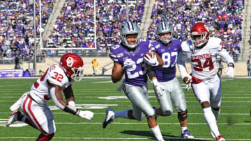 MANHATTAN, KS - OCTOBER 26: Wide receiver Joshua Youngblood #23 of the Kansas State Wildcats rushes for touchdown against safety Delarrin Turner-Yell #32 of the Oklahoma Sooners during the first half at Bill Snyder Family Football Stadium on October 26, 2019 in Manhattan, Kansas. (Photo by Peter G. Aiken/Getty Images)