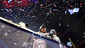 ATLANTA, GEORGIA - FEBRUARY 03: David Andrews #60 of the New England Patriots celebrates his teams 13-3 win over the Los Angeles Rams with the Vince Lombardi Trophy during Super Bowl LIII at Mercedes-Benz Stadium on February 03, 2019 in Atlanta, Georgia. (Photo by Maddie Meyer/Getty Images)