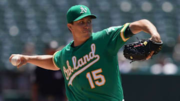 OAKLAND, CA - JULY 17: Homer Bailey #15 of the Oakland Athletics pitches against the Seattle Mariners in the top of the first inning at Ring Central Coliseum on July 17, 2019 in Oakland, California. (Photo by Thearon W. Henderson/Getty Images)