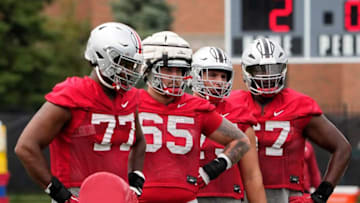 Aug 5, 2022; Columbus, OH, USA; Ohio State Buckeyes offensive lineman Paris Johnson Jr. (77), offensive lineman Zen Michalski (65), offensive lineman Carson Hinzman (75) and offensive lineman Tegra Tshabola (67) during practice at Woody Hayes Athletic Center in Columbus, Ohio on August 5, 2022.Ceb Osufb0805 Kwr 32