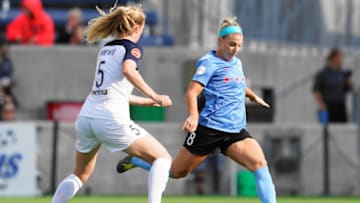 BRIDGEVIEW, IL - JULY 21: Chicago Red Stars midfielder Julie Ertz #8 passes the ball before NC Courage midfielder Samantha Mewis #5 can intervene during a NWLS soccer game between Chicago Red Stars and North Carolina Courage at SeatGeek Stadium on July 21, 2019 in Bridgeview, Illinois. (Photo by Daniela Porcelli/Getty Images)