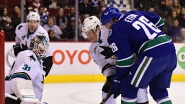 Mar 3, 2016; Vancouver, British Columbia, CAN; Vancouver Canucks forward Emerson Etem (26) shoots the puck against San Jose Sharks goaltender Martin Jones (31) during the first period at Rogers Arena. Mandatory Credit: Anne-Marie Sorvin-USA TODAY Sports