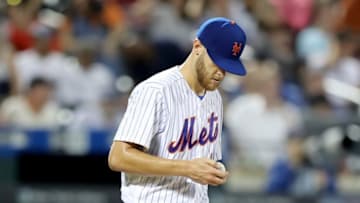 NEW YORK, NY - AUGUST 20: Zack Wheeler #45 of the New York Mets reacts after a run is scored in the seventh inning against the San Francisco Giants on August 20, 2018 at Citi Field in the Flushing neighborhood of the Queens borough of New York City. (Photo by Elsa/Getty Images)