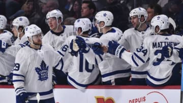 MONTREAL, QC - APRIL 06: William Nylander #29 of the Toronto Maple Leafs celebrates a second period goal with teammates on the bench against the Montreal Canadiens during the NHL game at the Bell Centre on April 6, 2019 in Montreal, Quebec, Canada. (Photo by Minas Panagiotakis/Getty Images)
