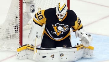 May 10, 2016; Pittsburgh, PA, USA; Pittsburgh Penguins goalie Matt Murray (30) makes a save against the Washington Capitals in overtime in game six of the second round of the 2016 Stanley Cup Playoffs at the CONSOL Energy Center. The Pens won 4-3 in overtime to win the series 4 games to 2. Mandatory Credit: Charles LeClaire-USA TODAY Sports