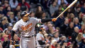 BOSTON, MA - MAY 4: Manny Machado #13 of the Baltimore Orioles hits a three run home run during the fourth inning of a game against the Boston Red Sox on May 4, 2017 at Fenway Park in Boston, Massachusetts. (Photo by Billie Weiss/Boston Red Sox/Getty Images)