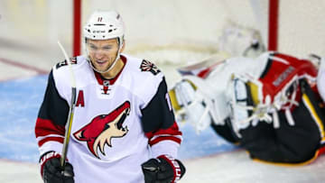 Jan 7, 2016; Calgary, Alberta, CAN; Arizona Coyotes center Martin Hanzal (11) celebrates his goal against the Calgary Flames during the third period at Scotiabank Saddledome. Arizona Coyotes won 2-1. Mandatory Credit: Sergei Belski-USA TODAY Sports